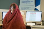 Molly Mahannah shivering at work in the summer in Omaha. NYT photo. 